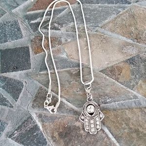 Hamsa necklace.